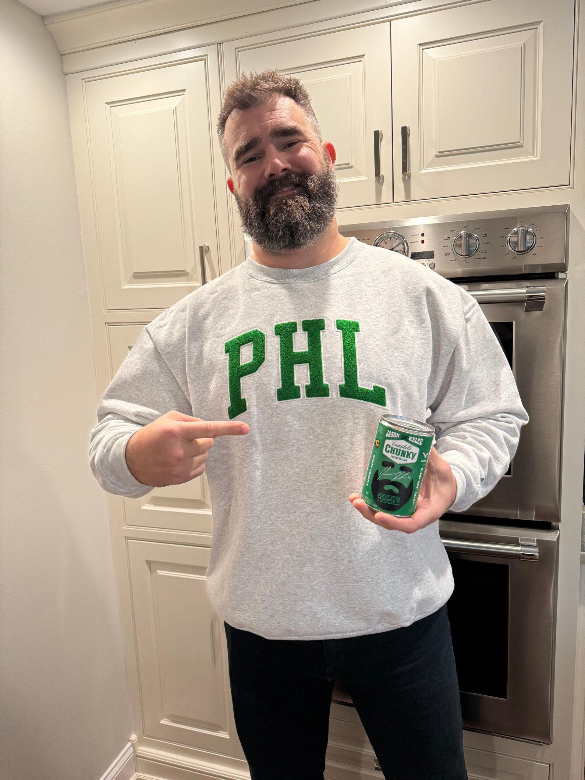 Jason Kelce proudly poses with limited edition Campbells Chunky Soup can featuring his face in honor of NFL retirement