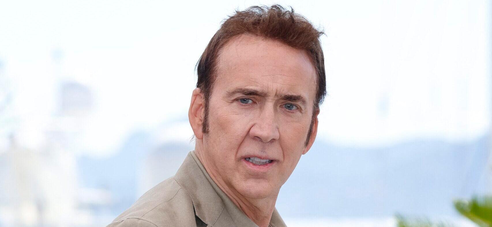 Nicolas Cage poses at the photo call of 'The Surfer' during the 77th Cannes Film Festival