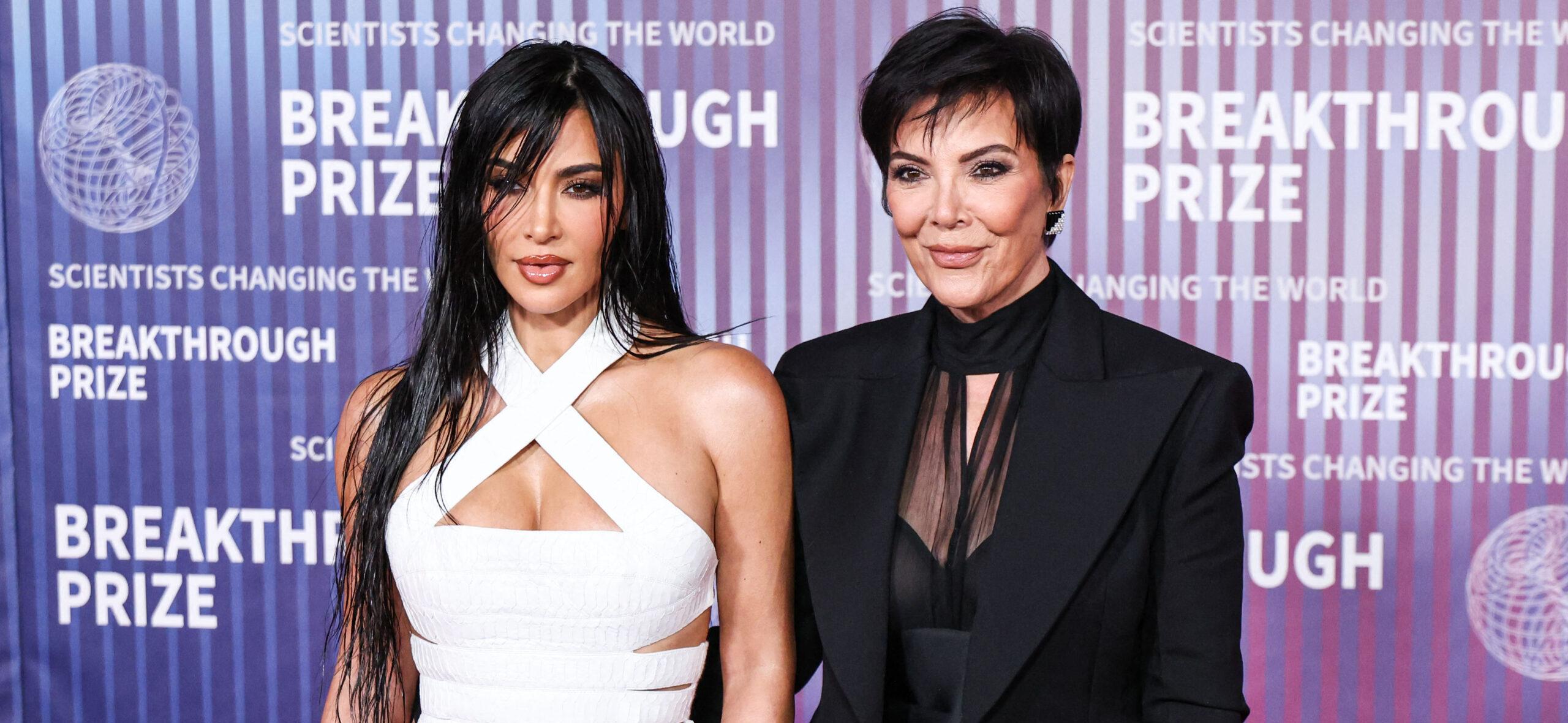 Kim Kardashian and Kris Jenner posing on the red carpet.