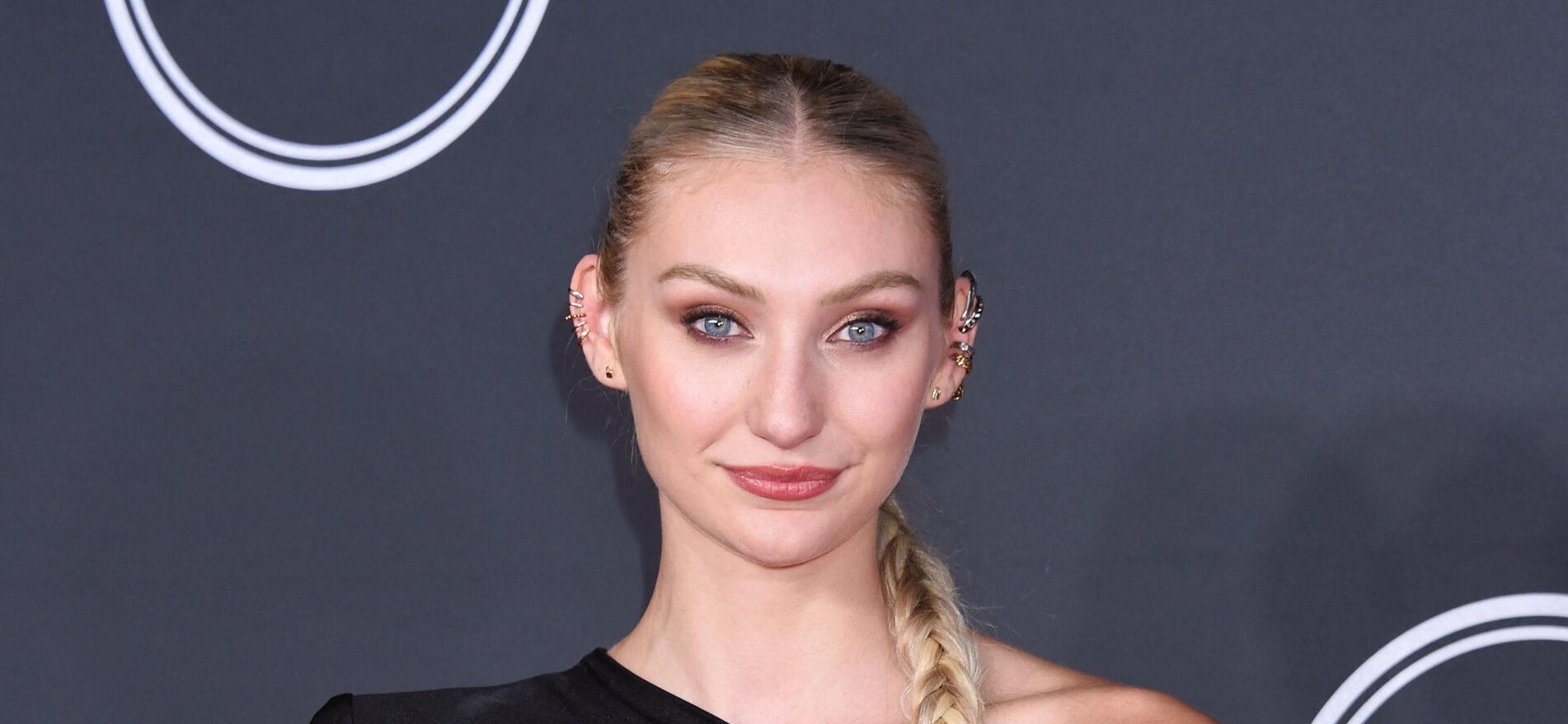 Cameron Brink posing in a black dress on the red carpet at the ESPYS.