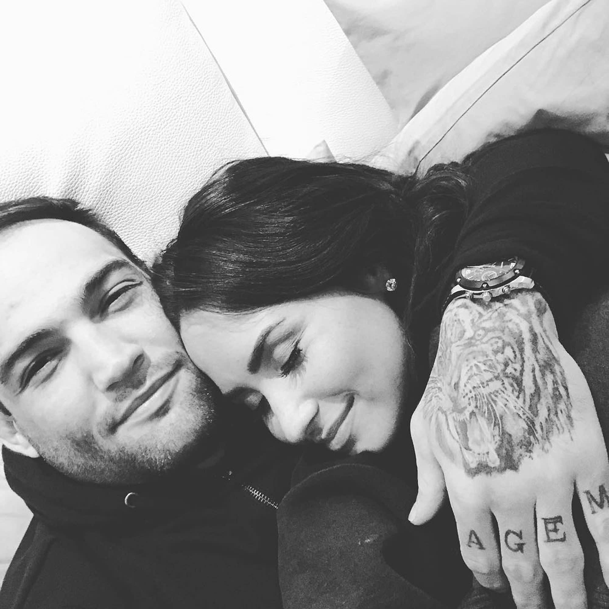 Guilherme Vasconcelo and Demi Lovato cuddle