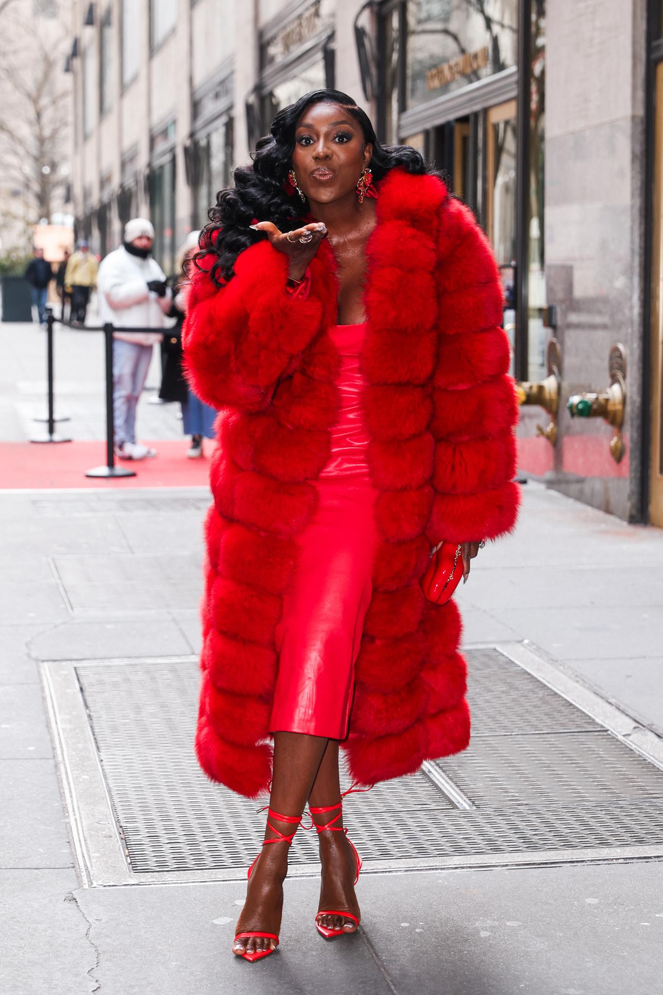 Wendy Osefo blowing a kiss into the camera. 