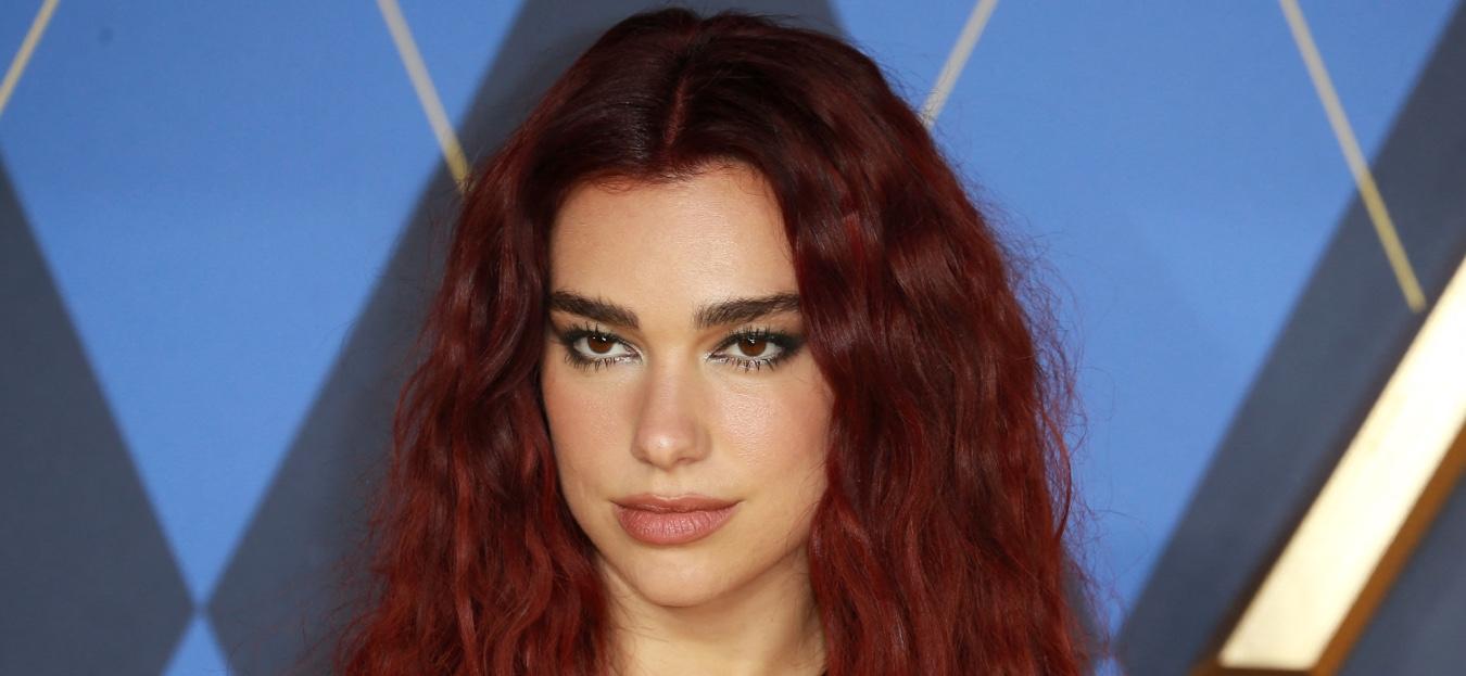 Dua Lipa Stuns In Cutout Swimsuit For YSL Beauty’s Latest Campaign