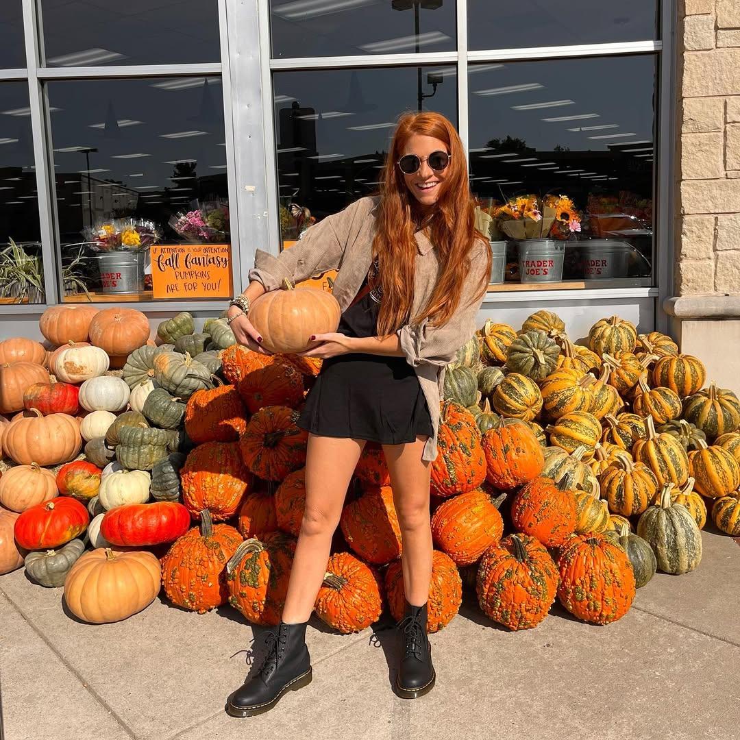 Jenn Todryk holding a pumpkin