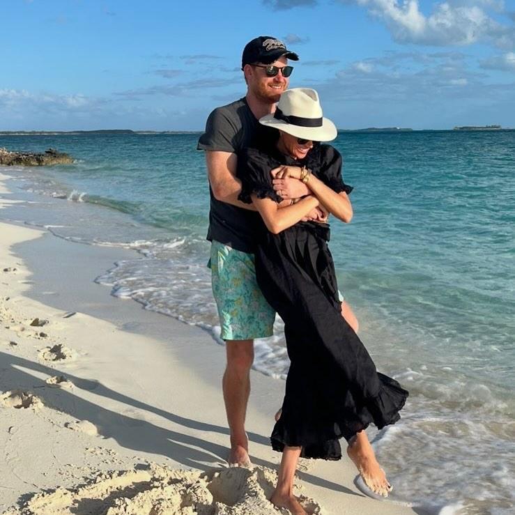 Prince Harry and Meghan Markle on a beach