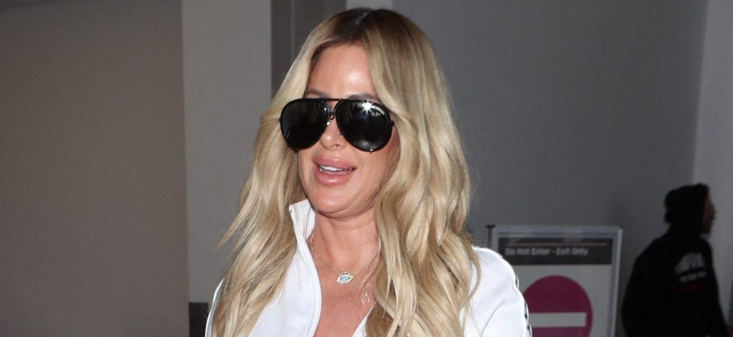 Kim Zolciak makes a sexy arrival as she is spotted at LAX with husband Kroy