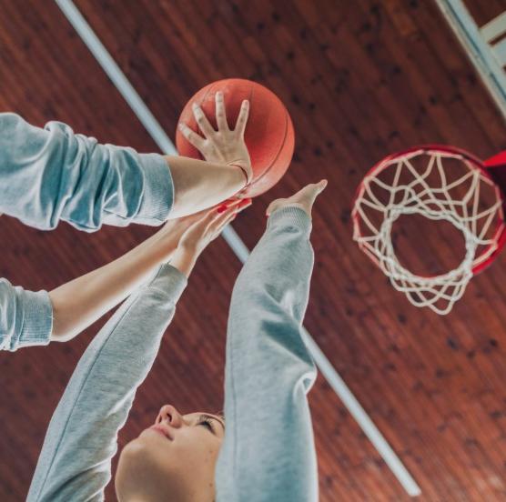 Girls playing basketball