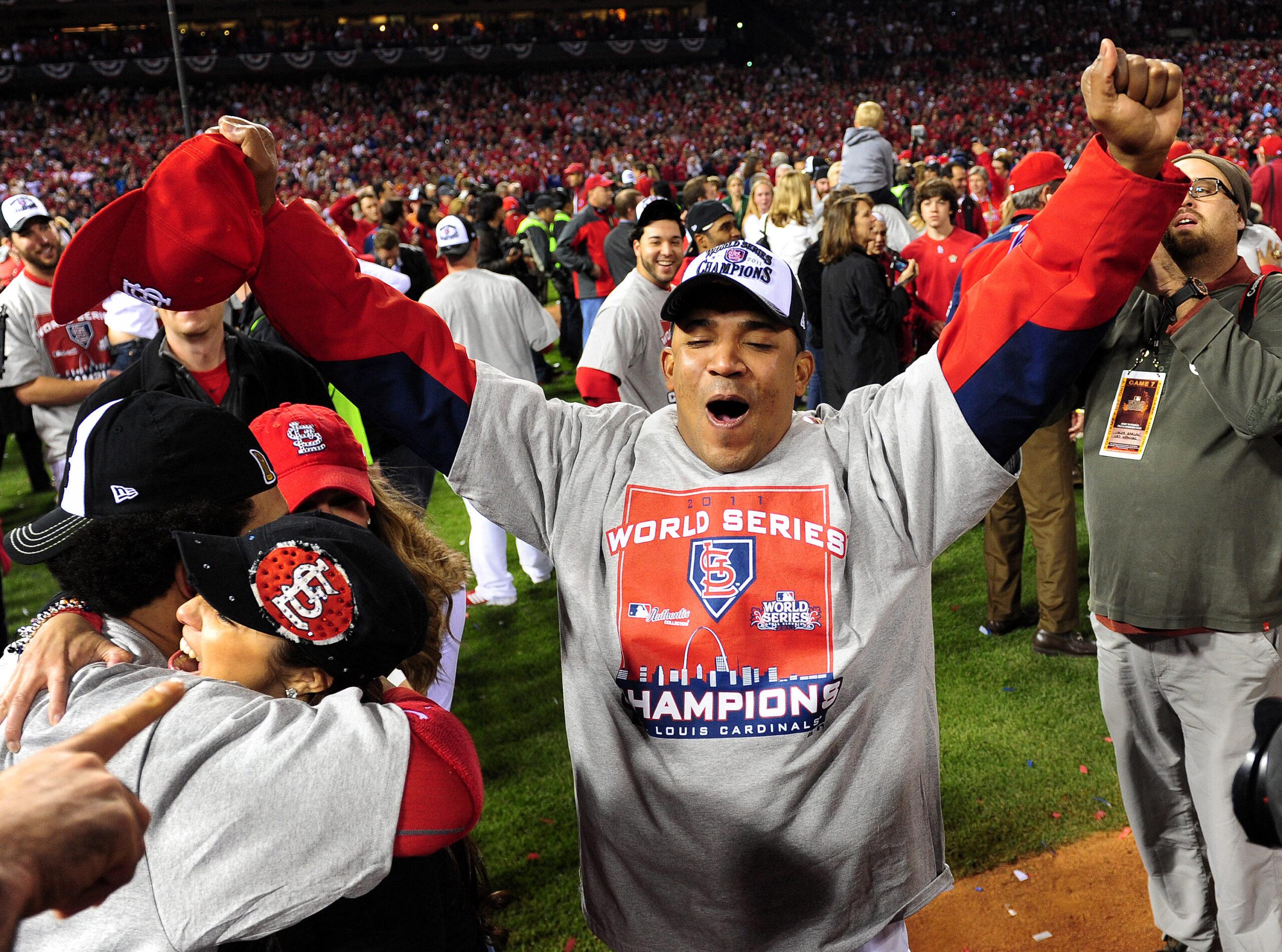 St. Louis Cardinals pitcher Octavio Dotel celebrates after the Cardinals won the 2011 World Series in St. Louis on October 28, 2011.