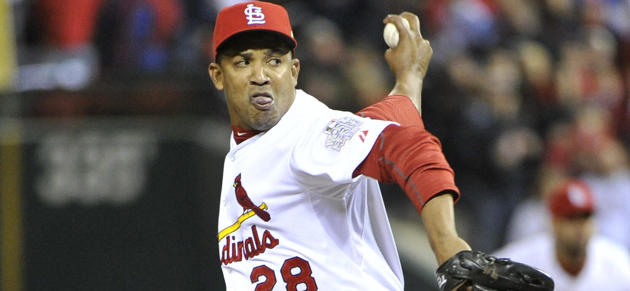 St. Louis Cardinals Octavio Dotel (28) pitches in relief in the seventh inning against the Texas Rangers in game 7 of the World Series at Busch Stadium on October 28, 2011 in St. Louis.