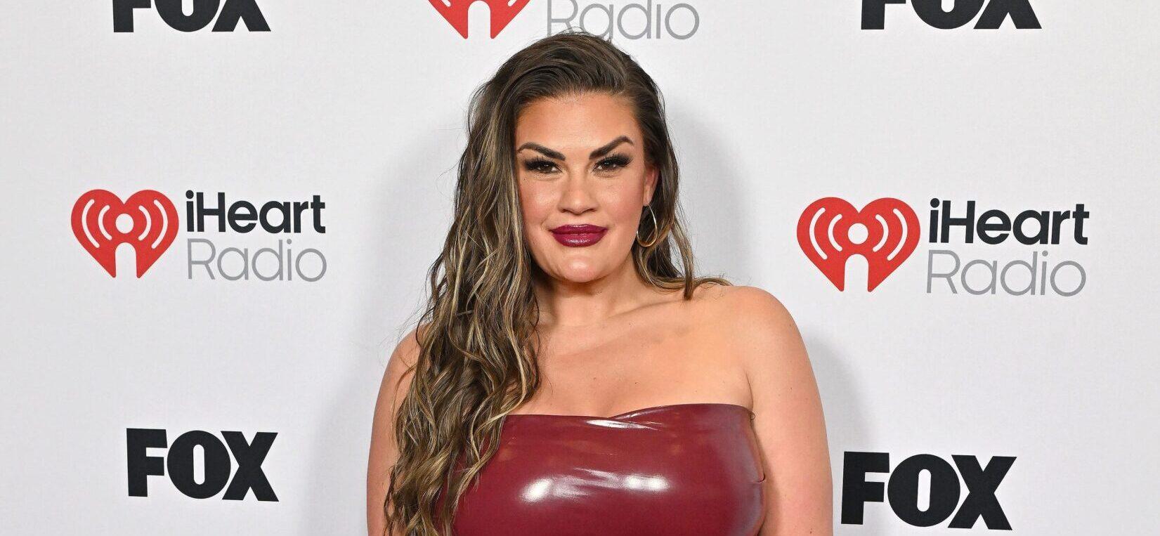 Brittany Cartwright posing on the red carpet.
