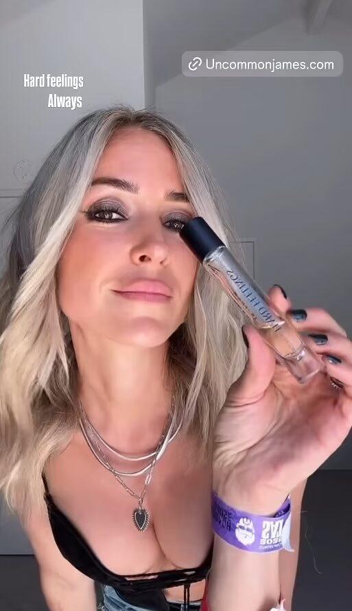 Kristin Cavallari holding lipgloss