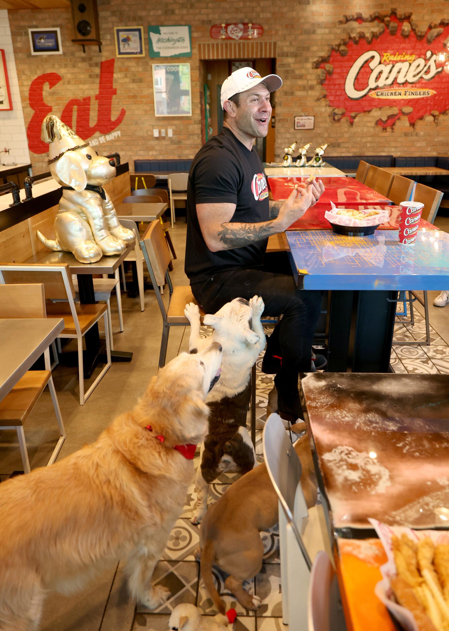 TikTok Animal Welfare Activist Lee Asher Accepts $100,000 Check from Raising Cane's for The Asher House Nonprofit
