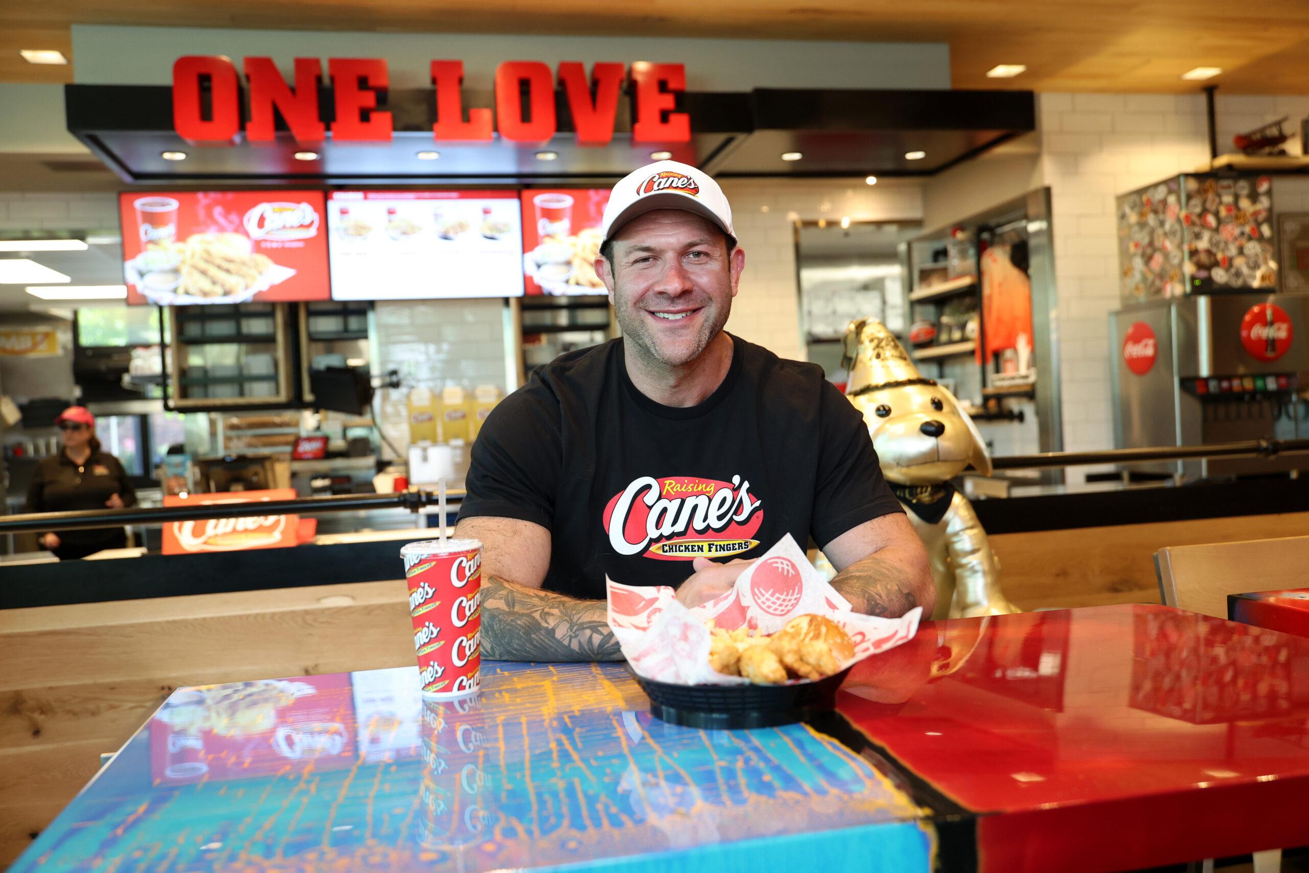 TikTok Animal Welfare Activist Lee Asher Accepts $100,000 Check from Raising Cane's for The Asher House Nonprofit