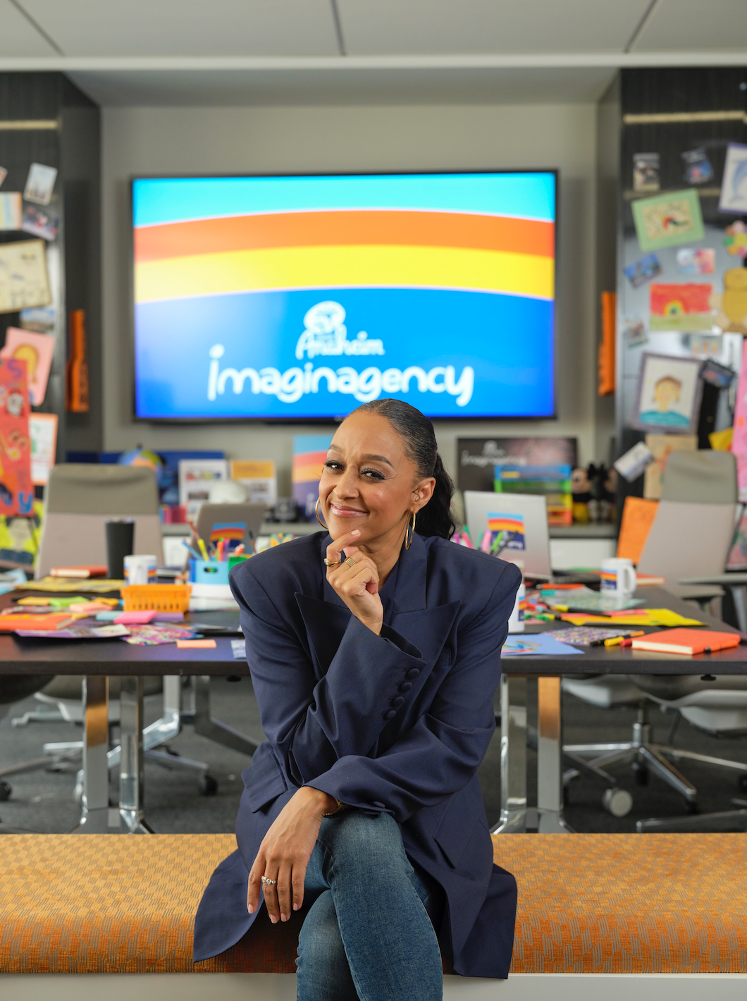 Tia Mowry sitting down
