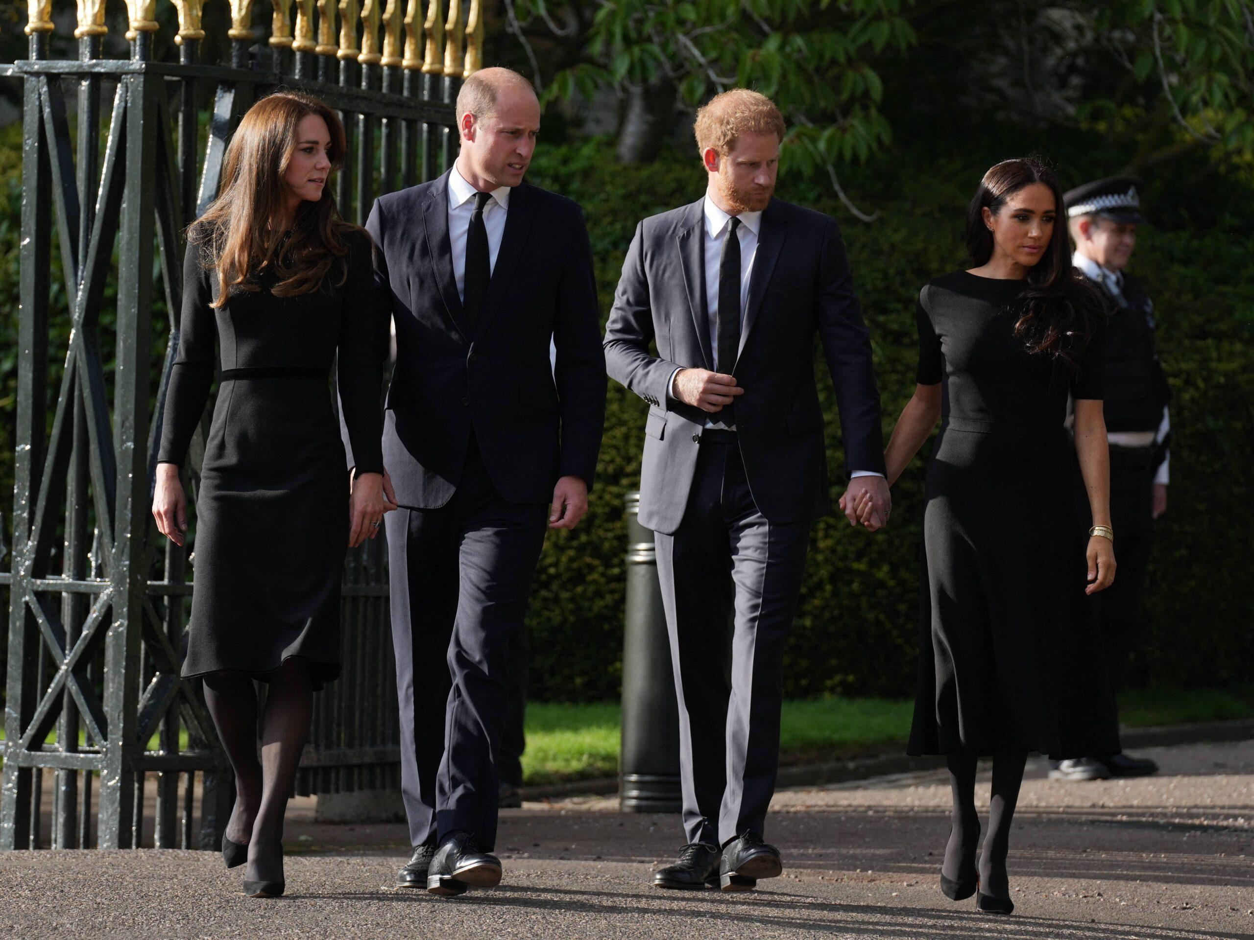 The Prince and Princess of Wales along with Prince Harry and Meghan Markle the Duke and Duchess of Sussex view the tributes at Windsor