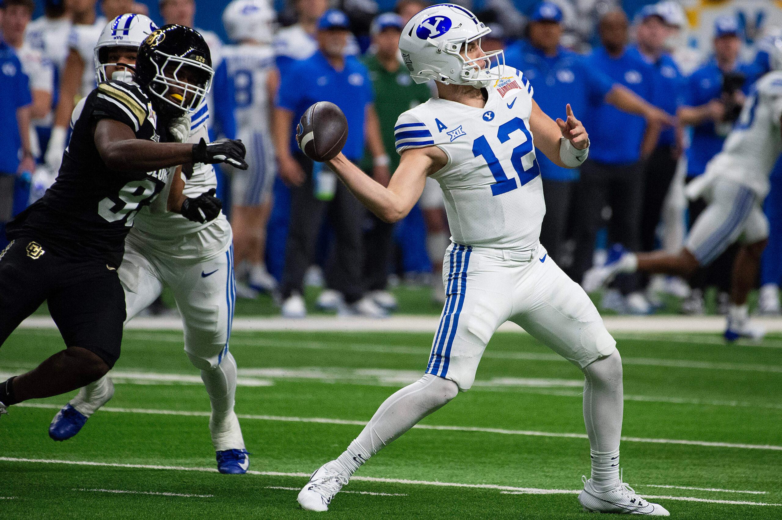 Jake Retzlaff (12) of the BYU Cougars in action at the NCAA Valero Alamo Bowl against the Colorado Buffalos at the Alamodome