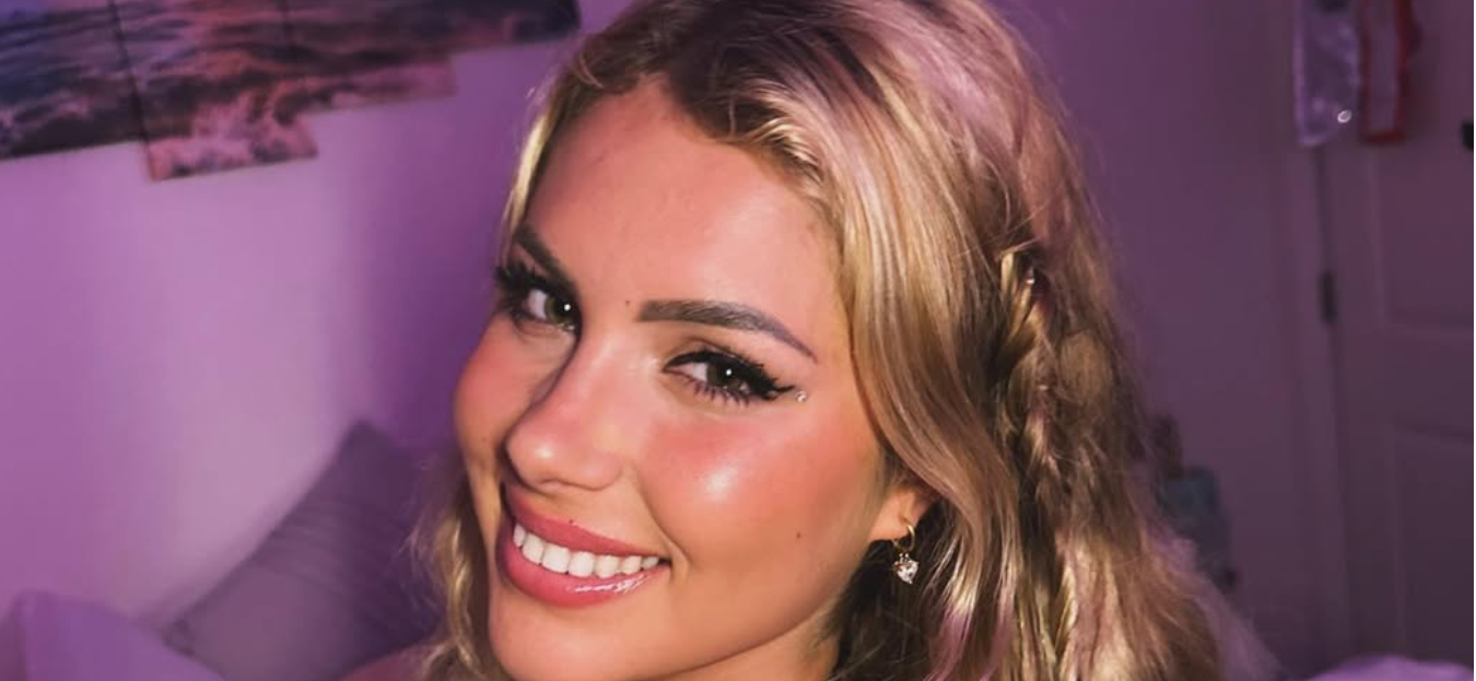 Andreea Dragoi smiles at the camera.