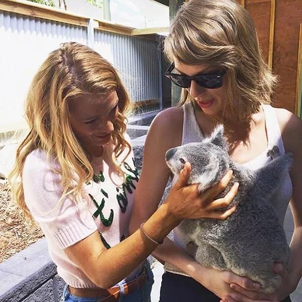 Blake Lively and Taylor Swift with a cat