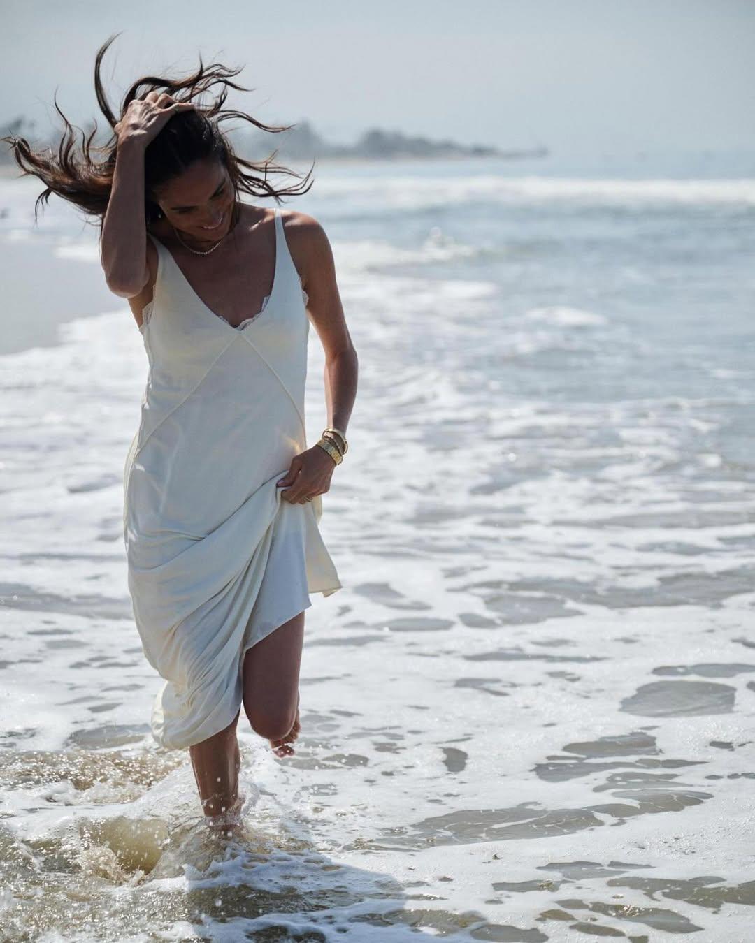Meghan Markle running on the beach