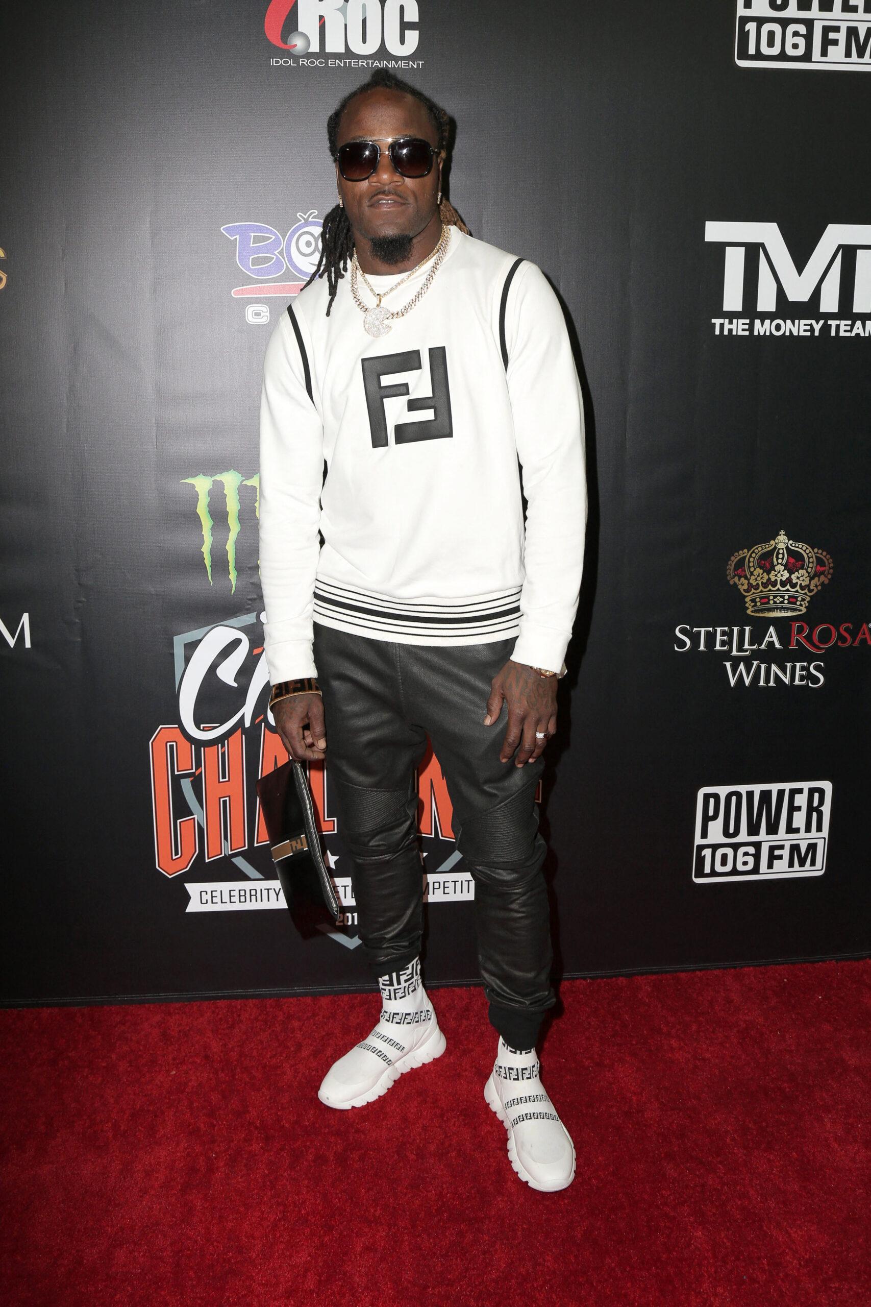 Adam Jones posing on the red carpet. 