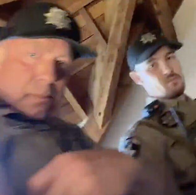 Police officers on Kelley Wolf's livestream