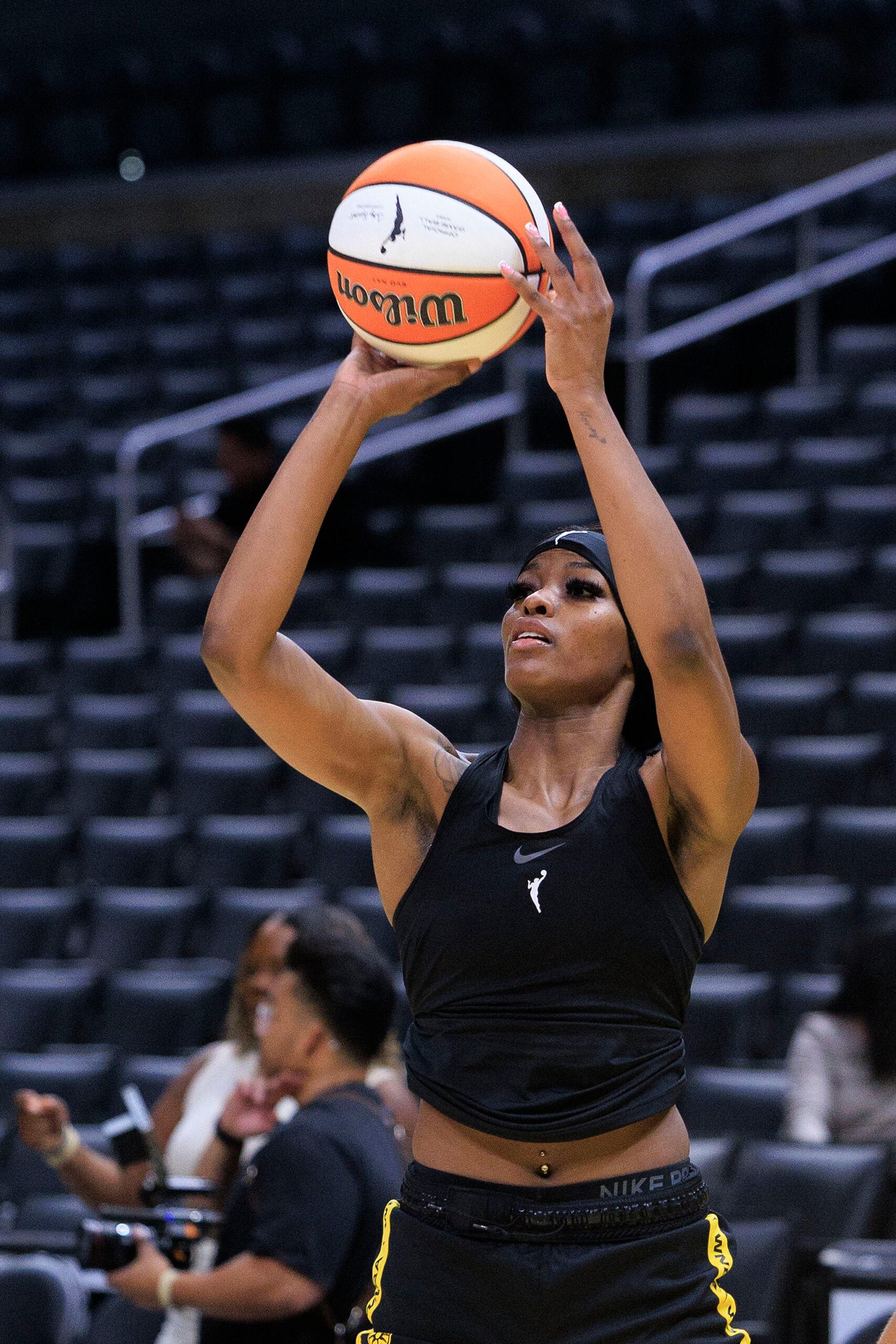 Rickea Jackson shooting a basketball. 
