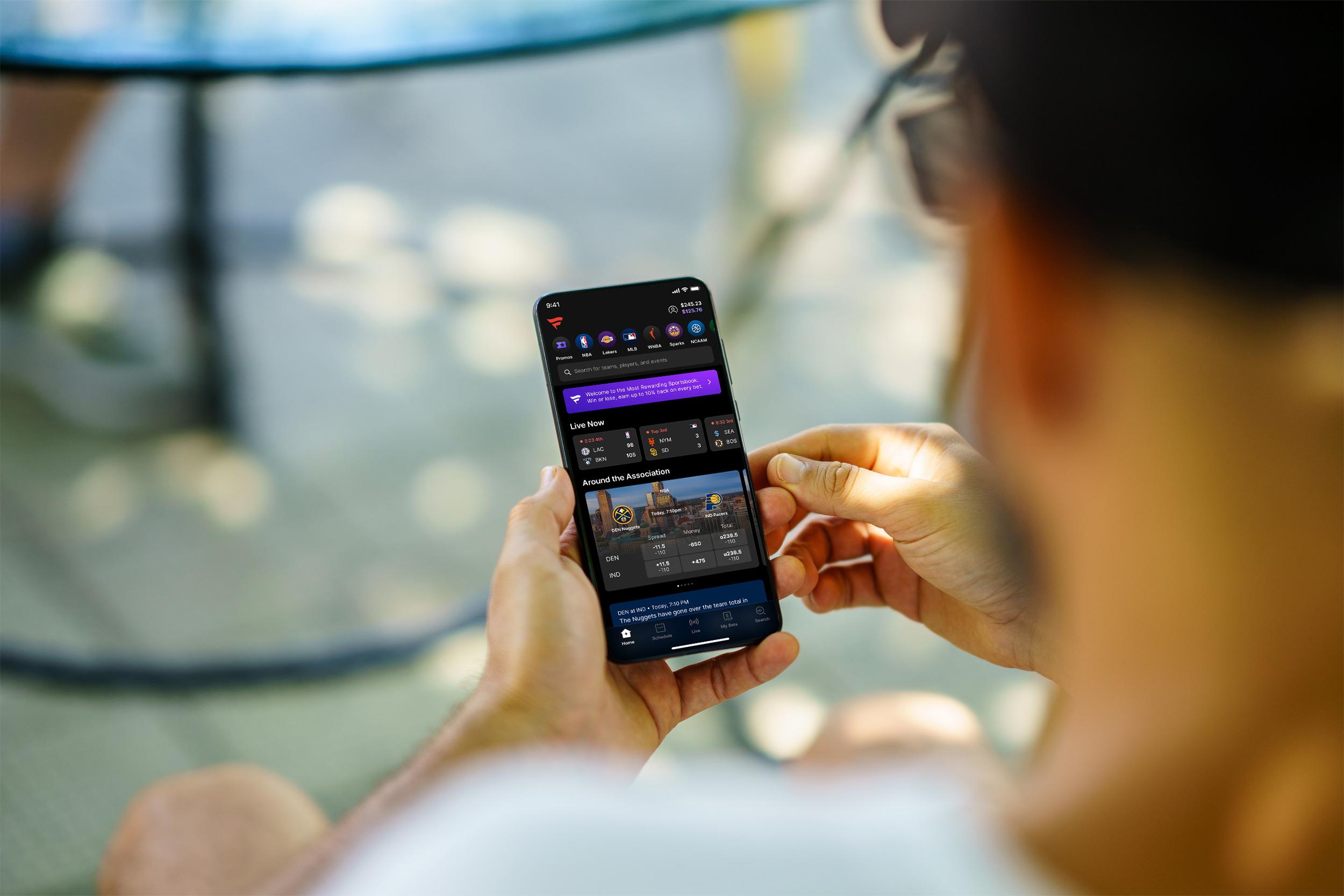 A user using Fanatics Sportsbook. 