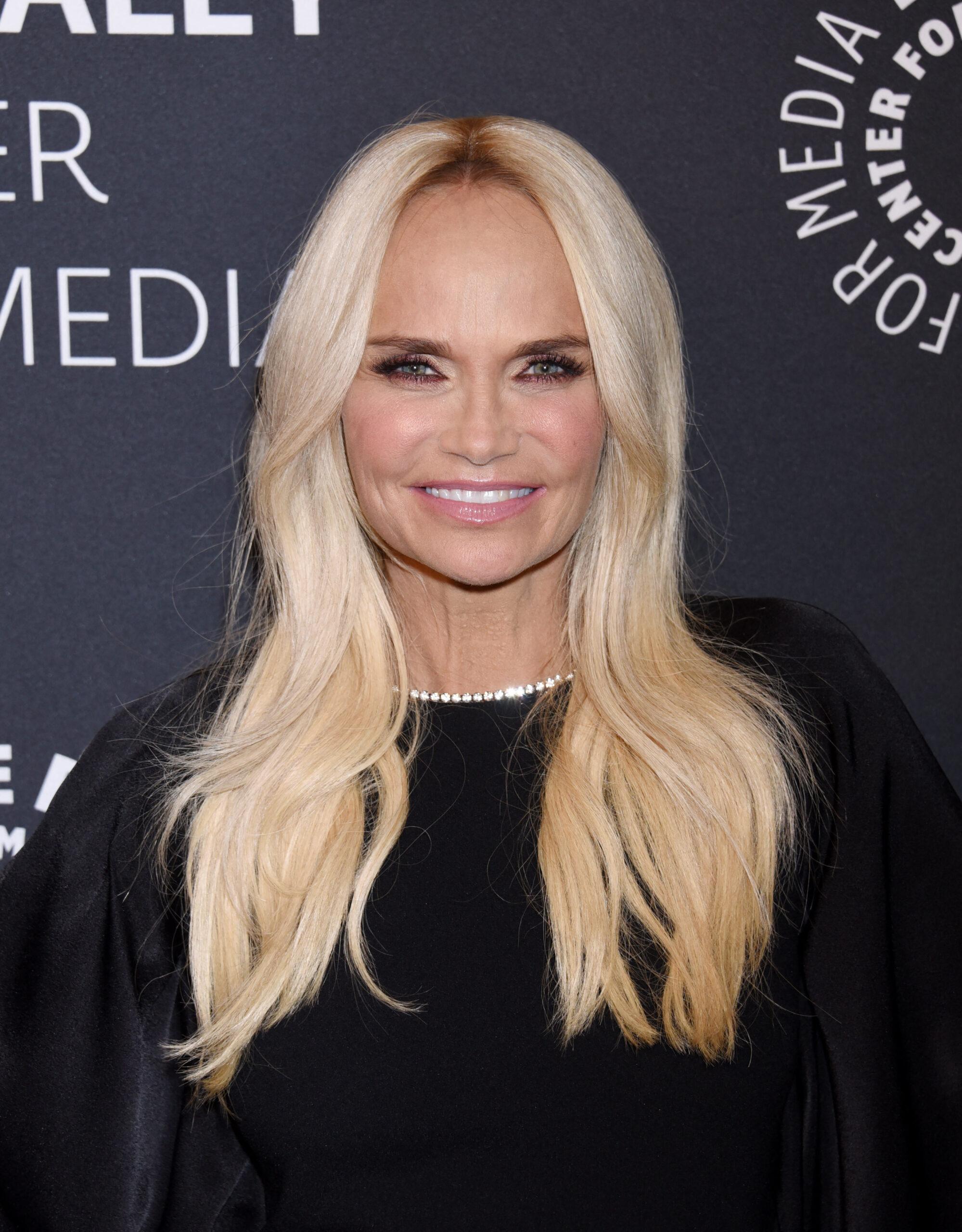 Kristin Chenoweth posing on the red carpet. 