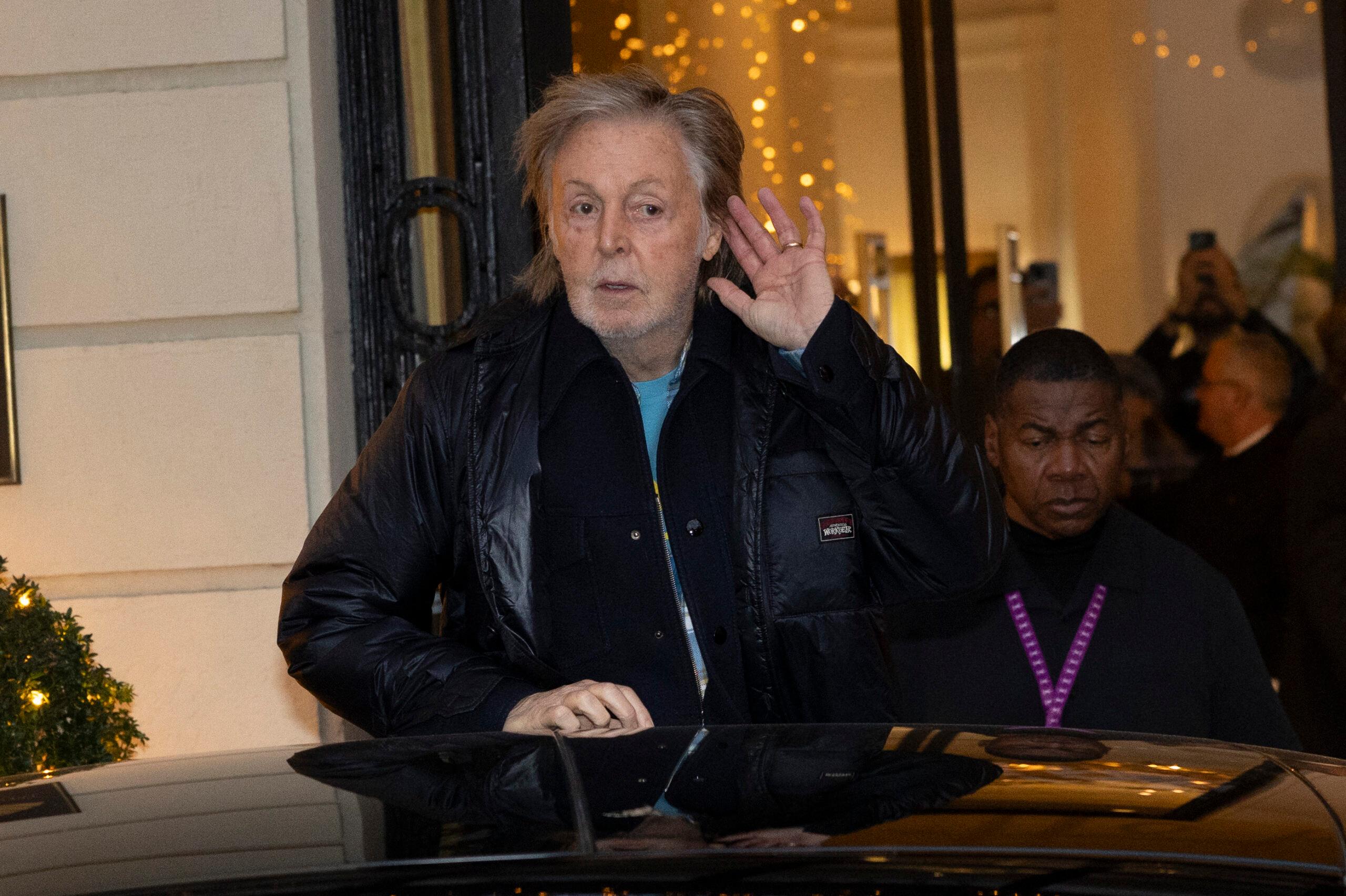 Paul McCartney leaves the hotel where he is staying in Madrid