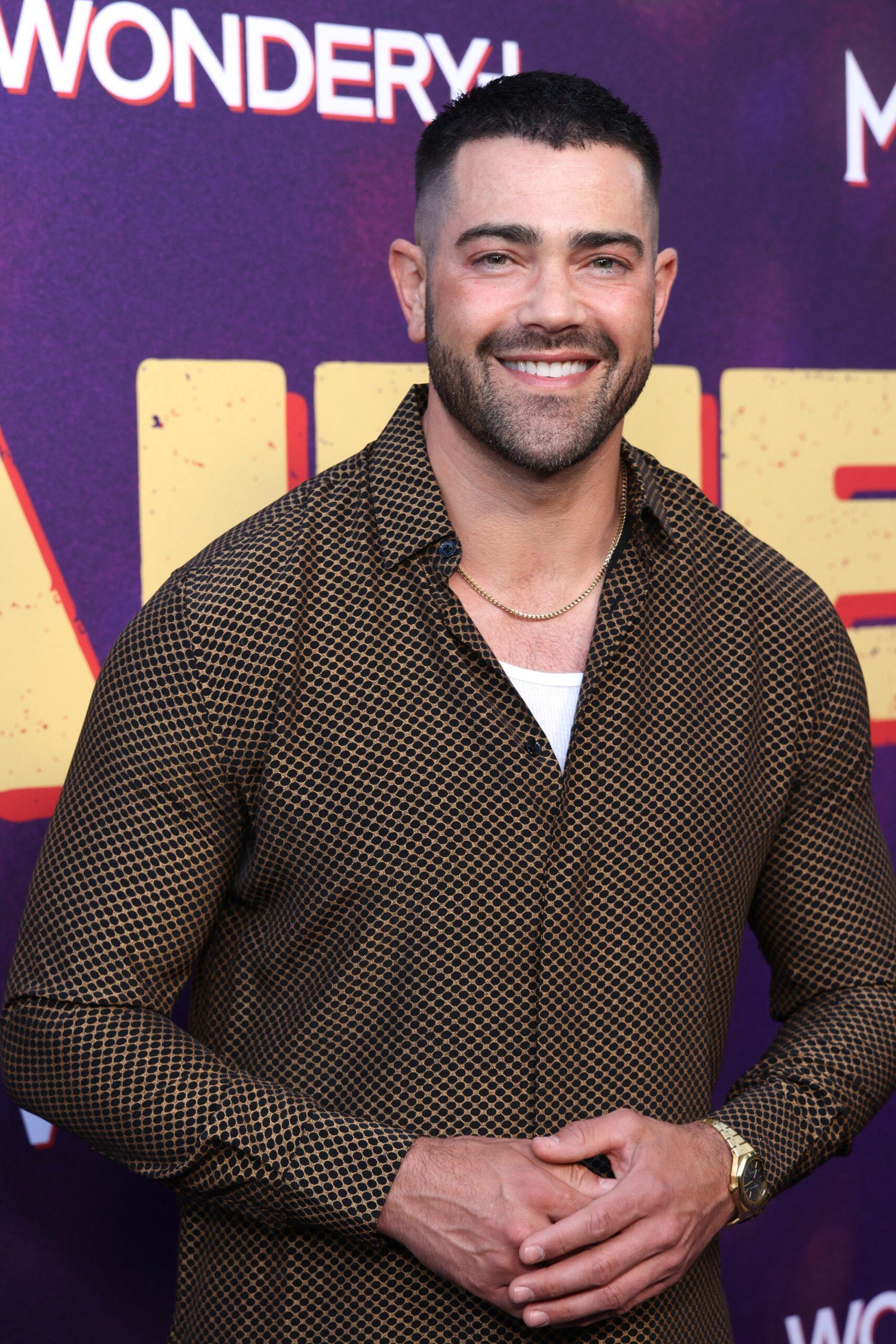 Jesse Metcalfe posing on the red carpet. 