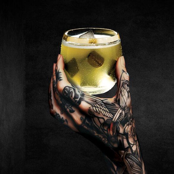 Michael Voltaggio holding a drink