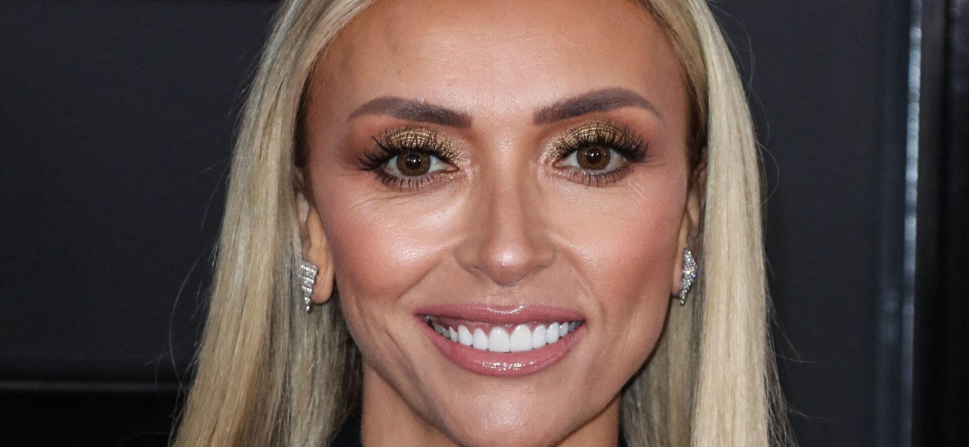 Giuliana Rancic posing on the red carpet.