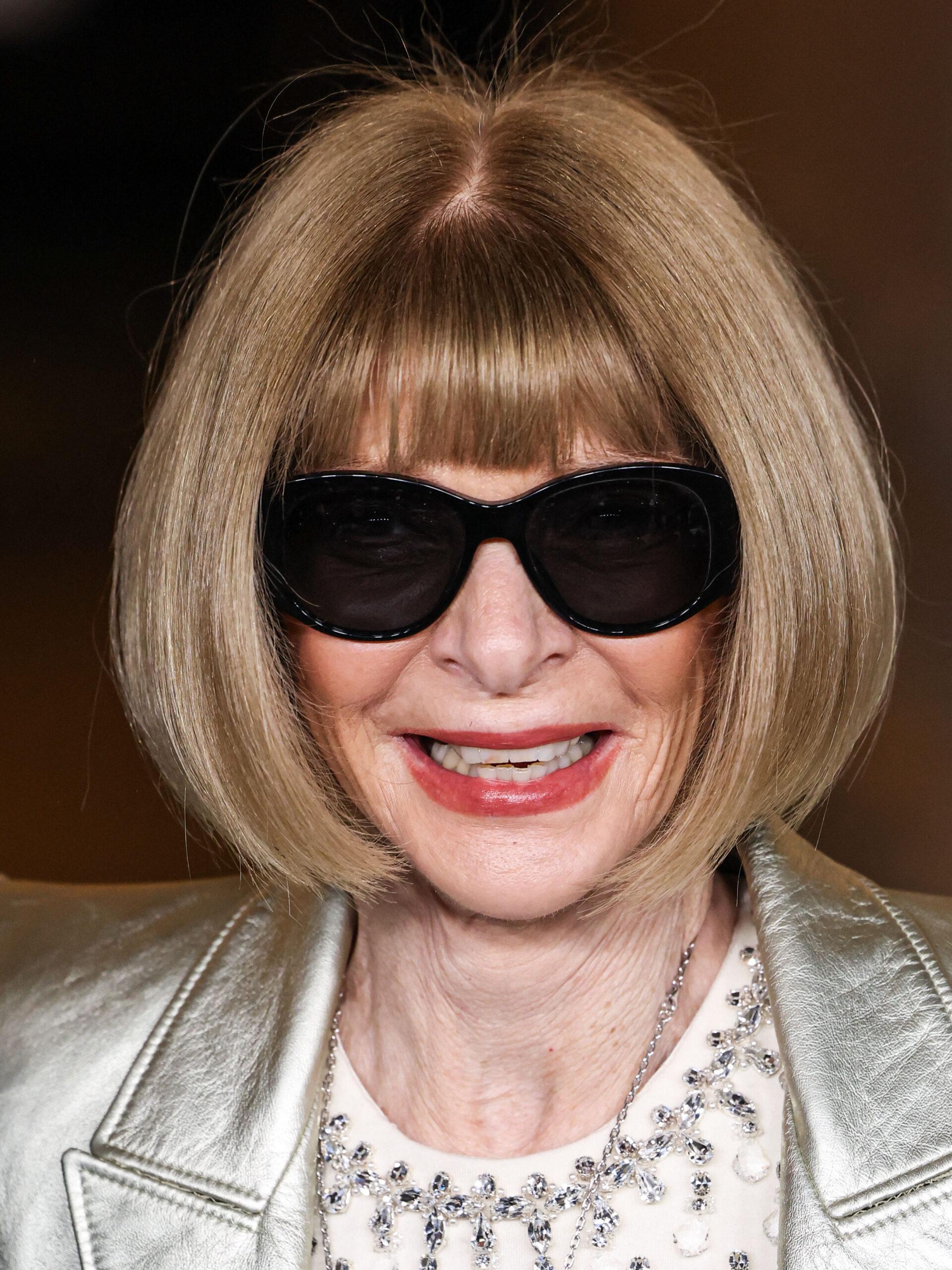 Anna Wintour posing on the red carpet. 