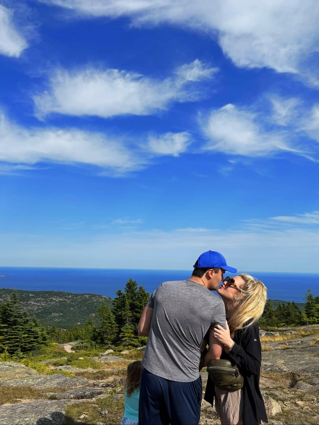 Erika and Charlie Kirk in mountains