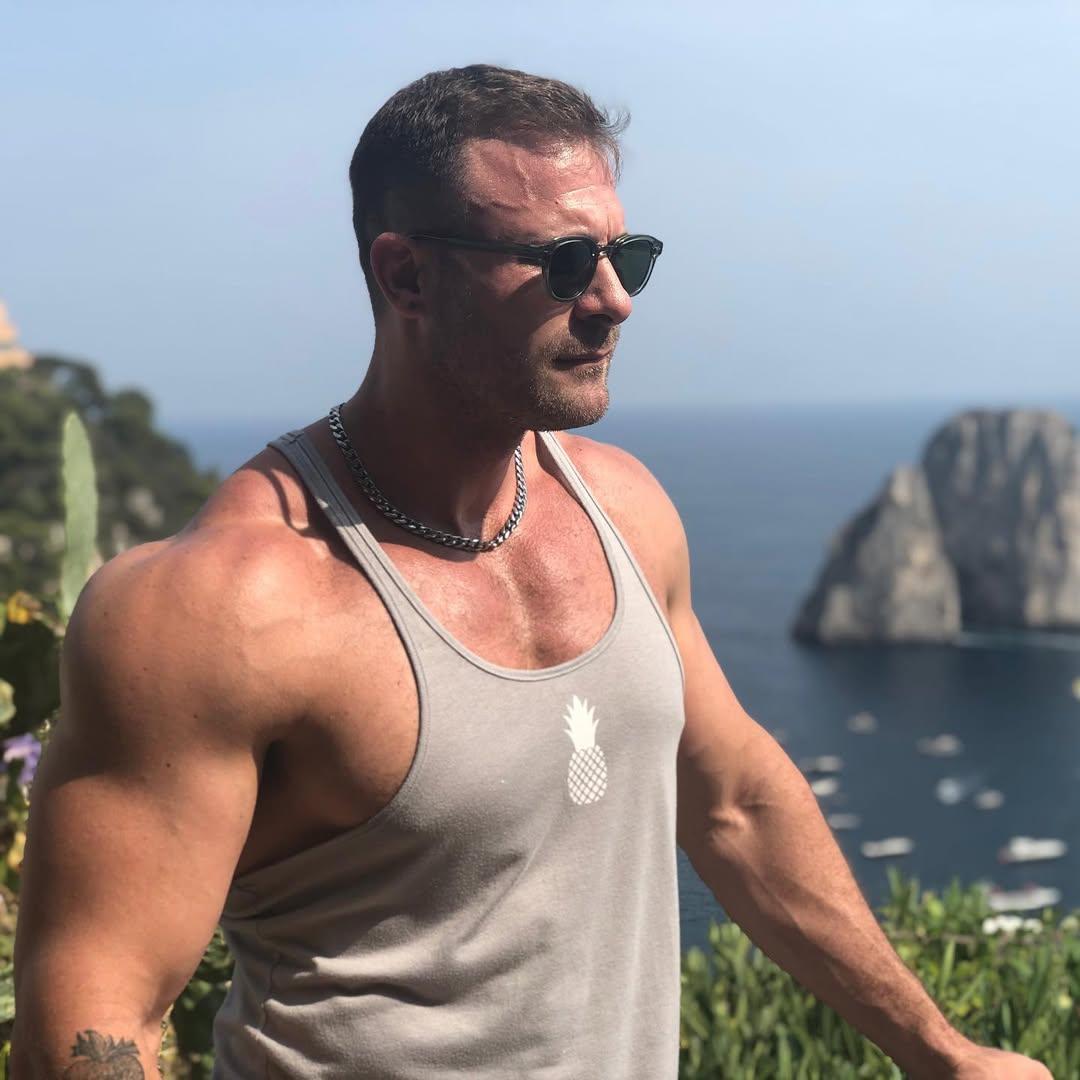 Austin Wolf posing outside. 