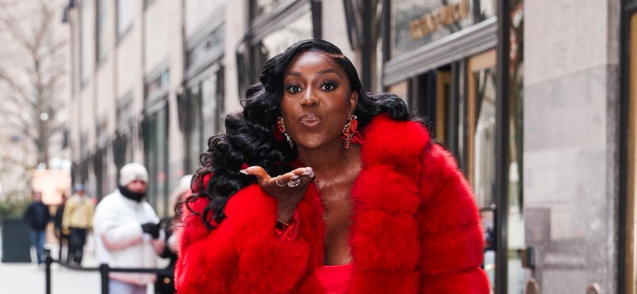 Wendy Osefo blowing a kiss