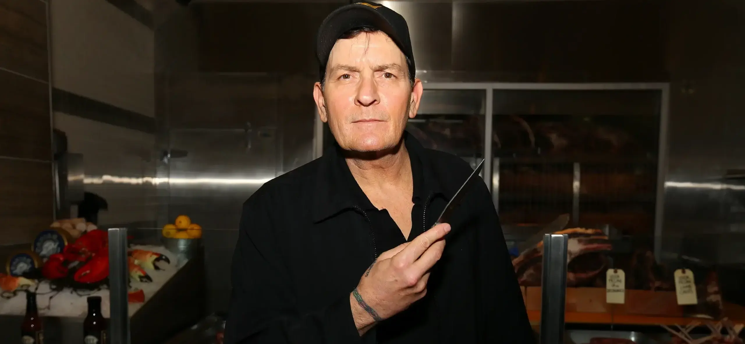 Charlie Sheen is presented with his personally engraved knife at NYY Steak inside Seminole Casino Coconut Creek, in Coconut Creek Florida.
