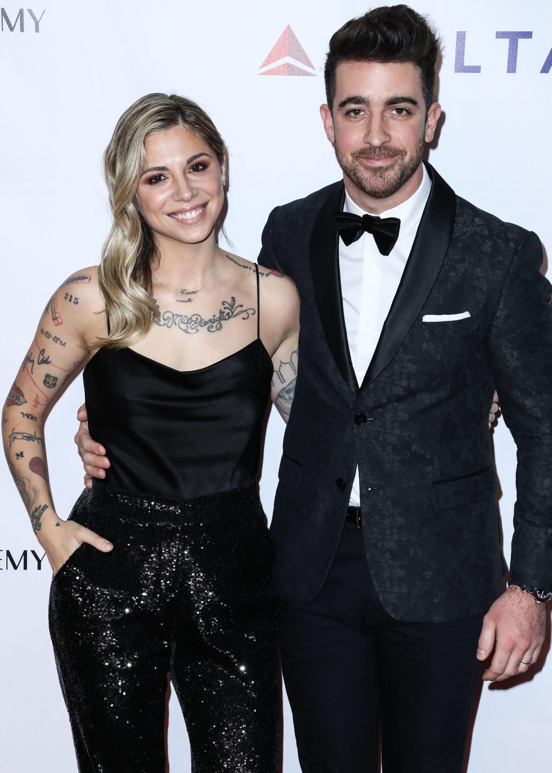 Christina Perri and Paul Costabile at the 2019 MusiCares Person Of The Year Honoring Dolly Parton