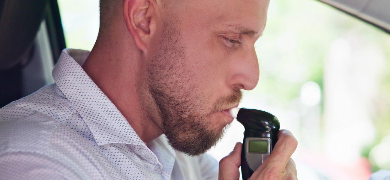 Man taking breathalyzer