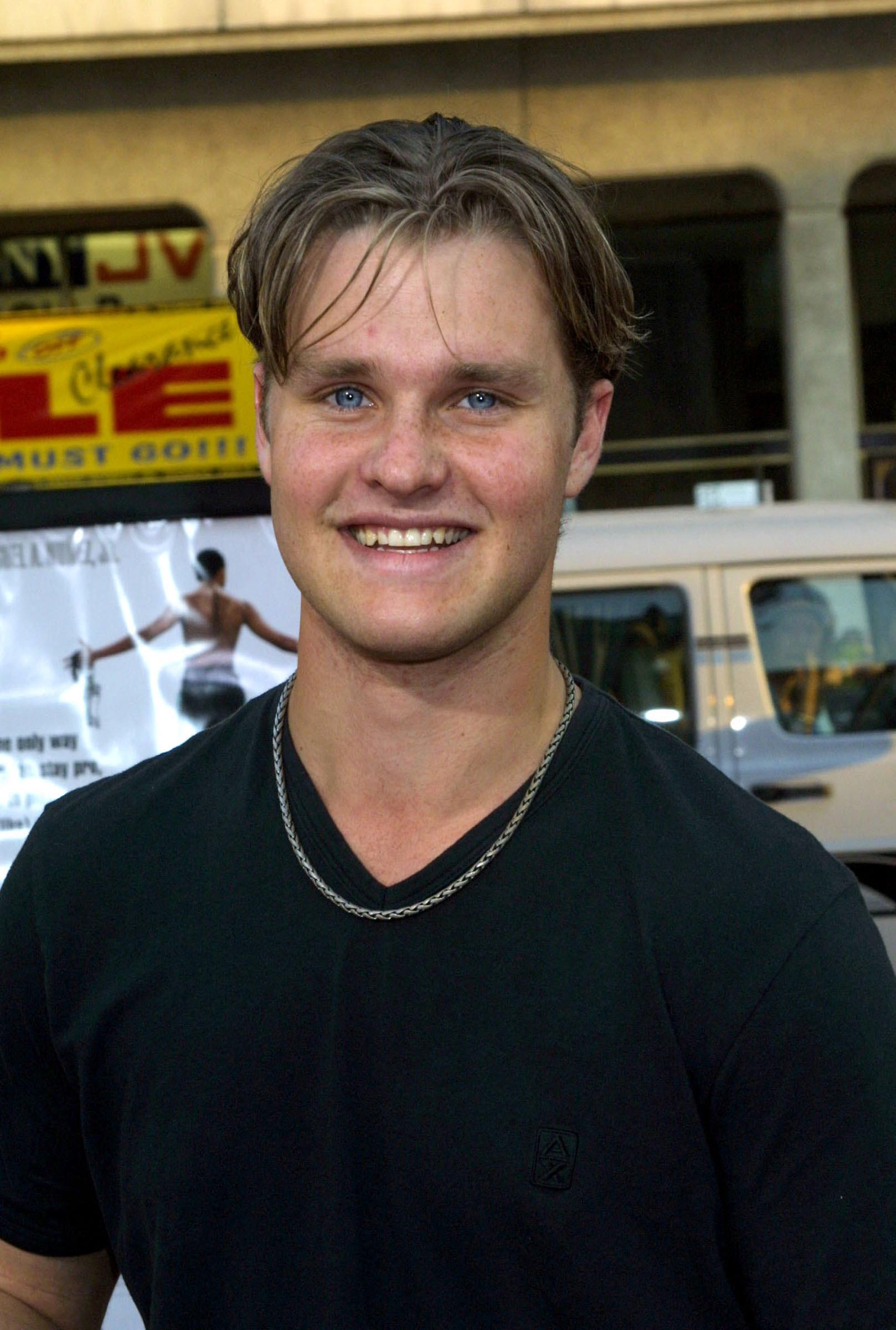 Zachery Ty Bryan posing on the red carpet. 