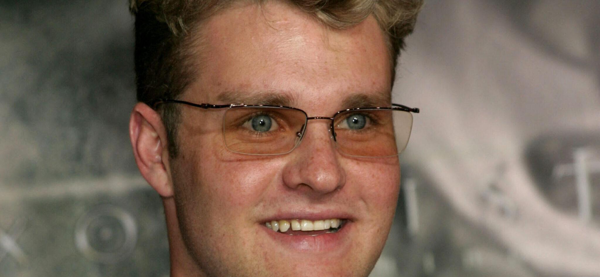 Zachery Ty Bryan posing on the red carpet.