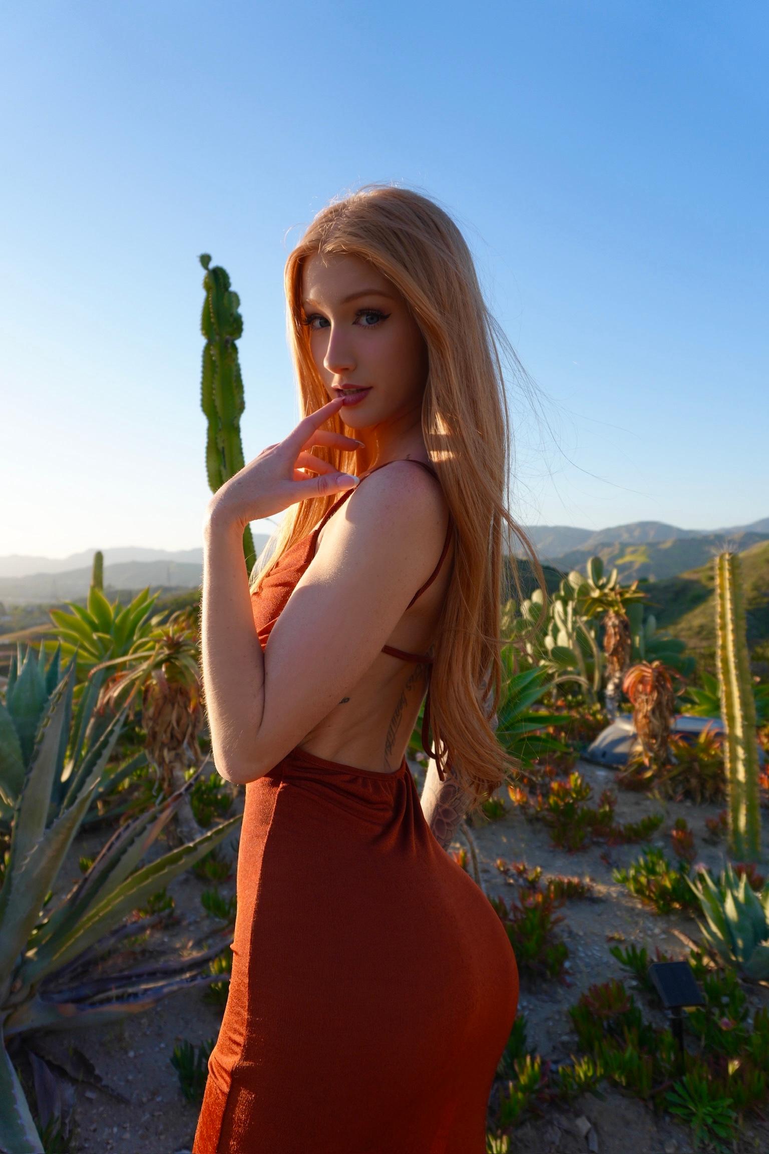 Avery Skye flirty pose outside