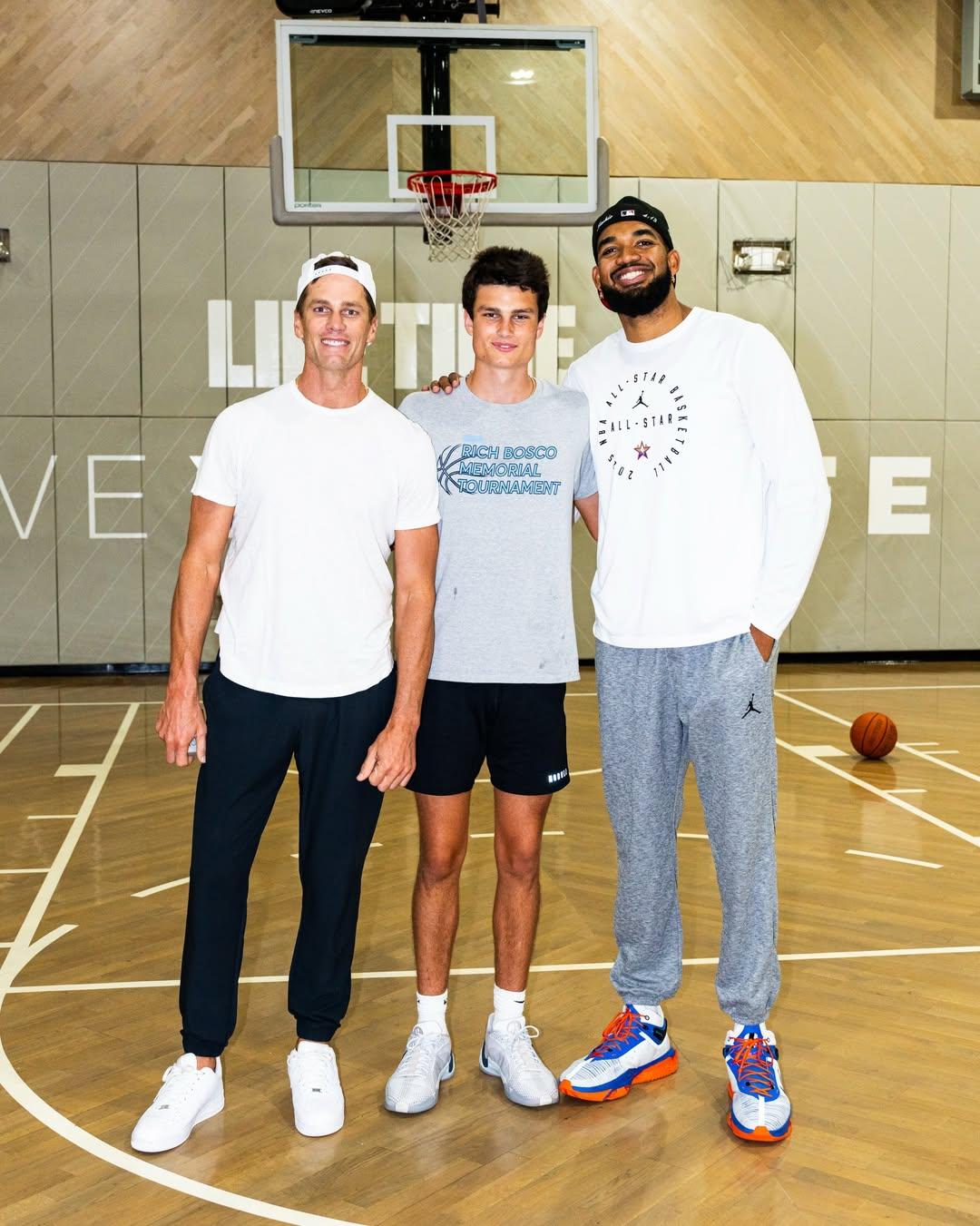 Tom Brady posing with his son, Jack Moynahan and NBA star Karl-Anthony Towns.