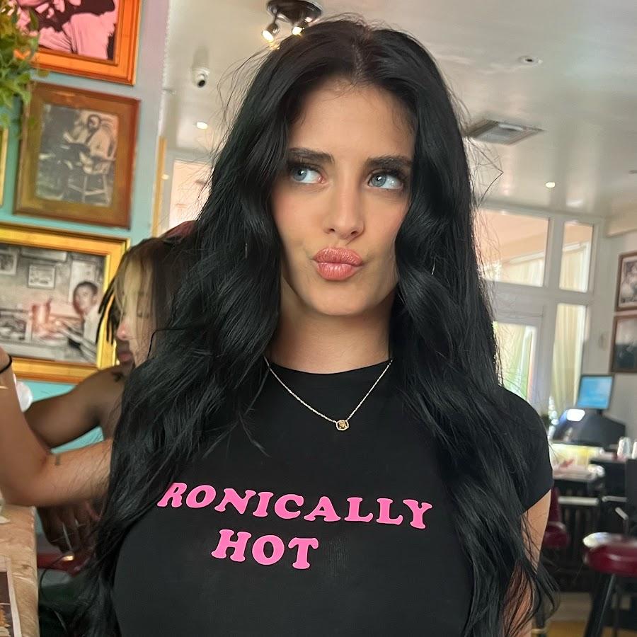 Camilla Araujo selfie with ironically hot shirt