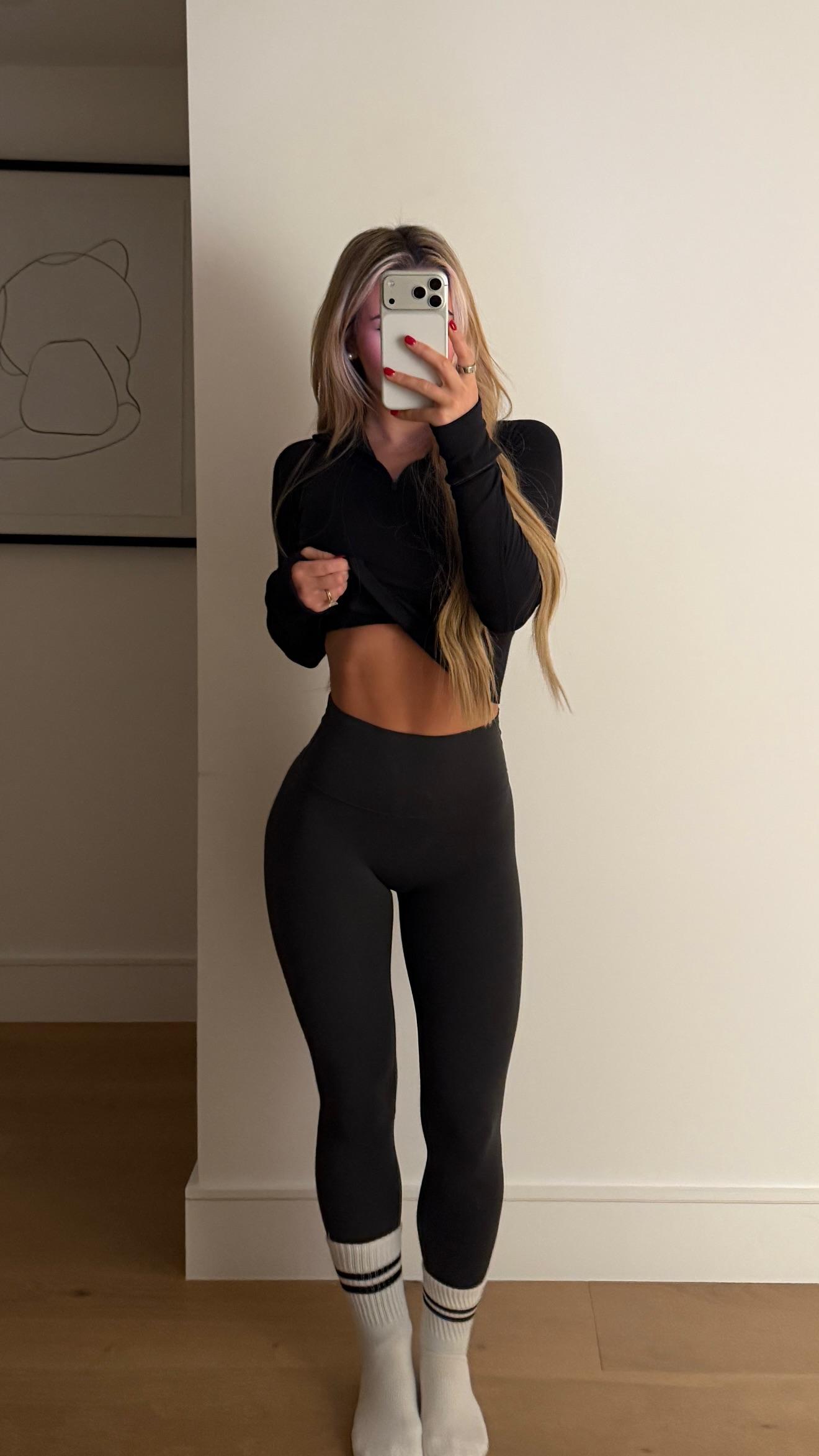 Emily Elizabeth in a black outfit