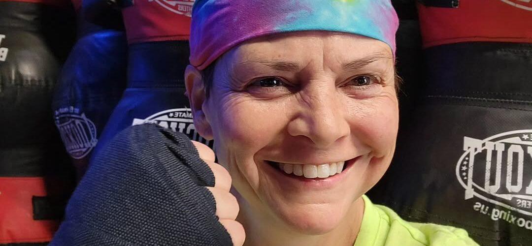 Wenne Alton Davis holding up her first