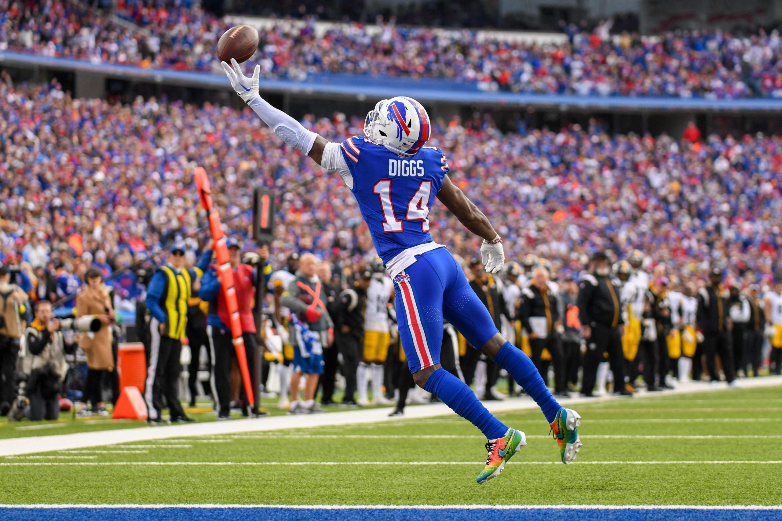 Stefon Diggs catching a football