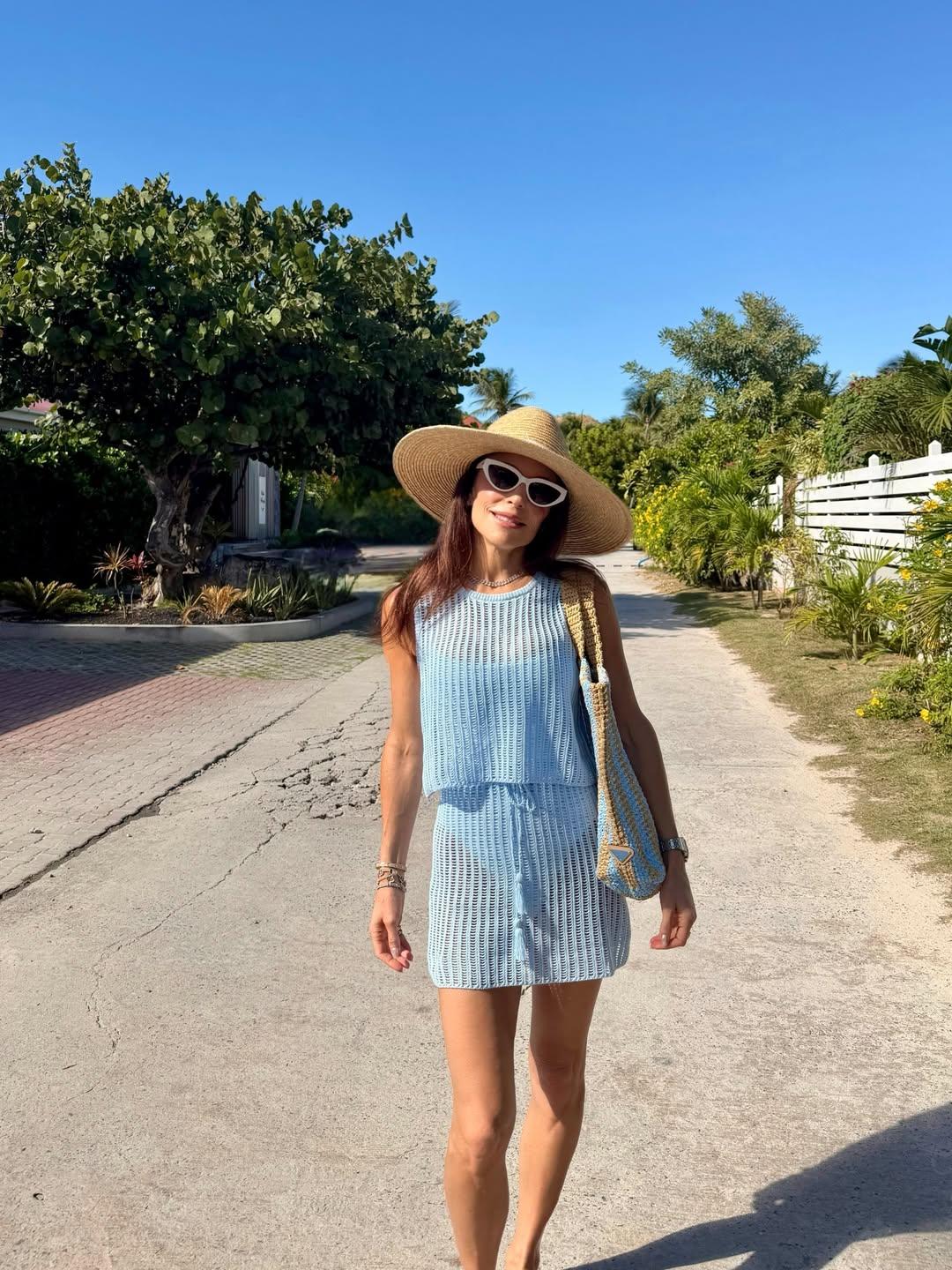Bethenny Frankel wearing a hat walking on the street