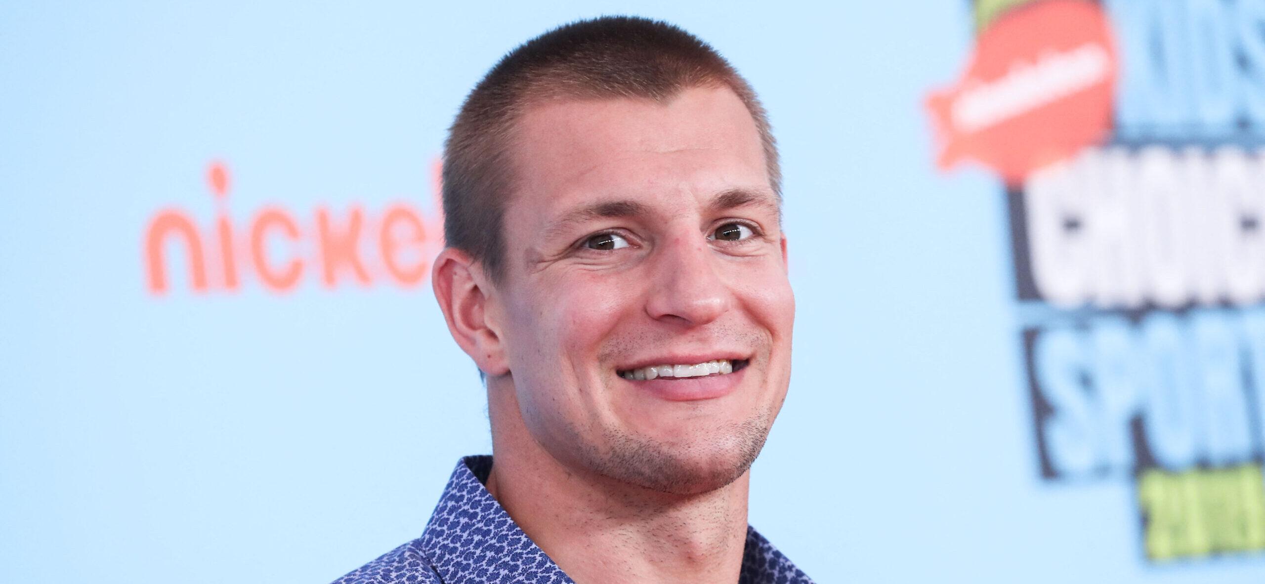 Rob Gronkowski posing on the red carpet.