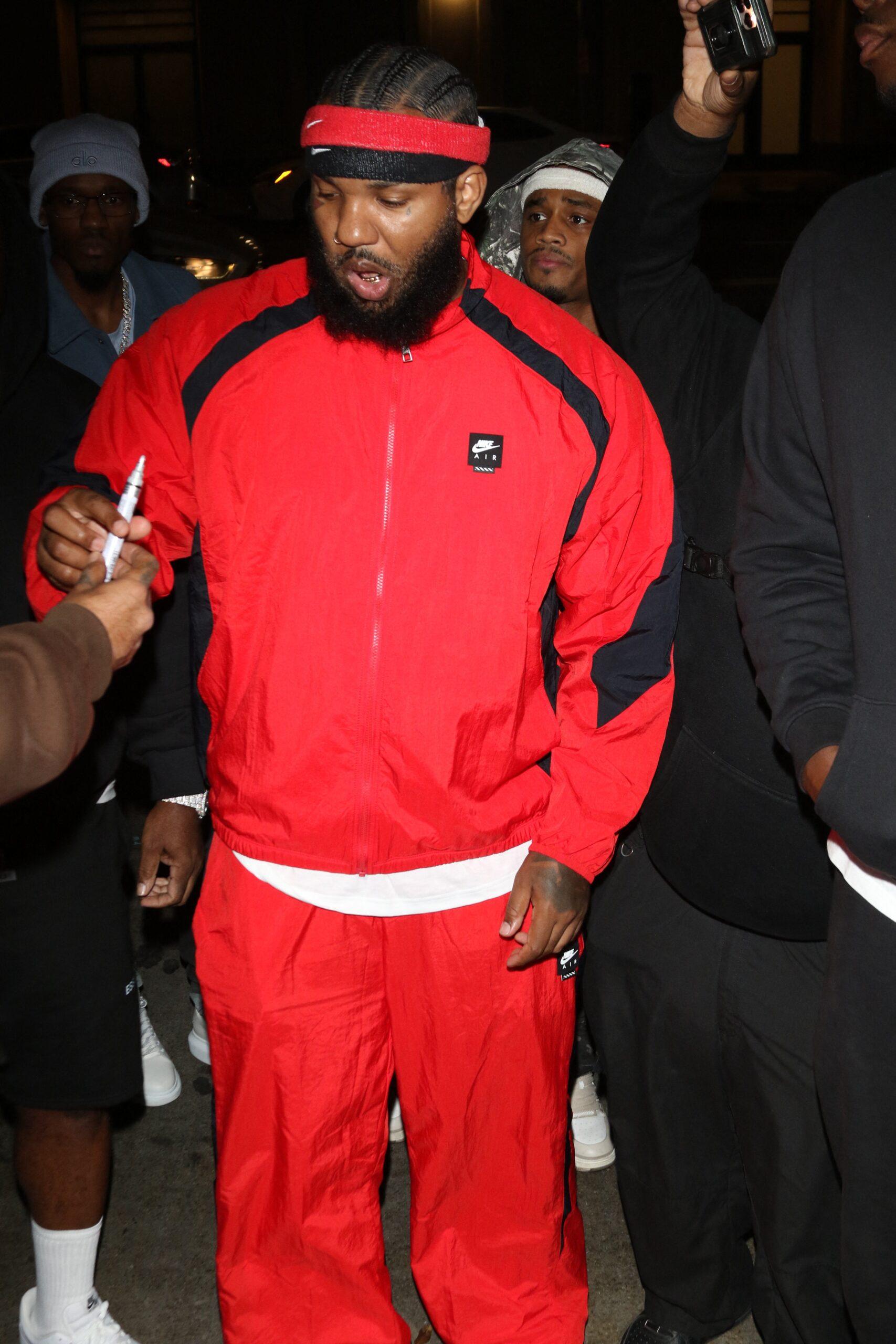 The Game signing autographs.